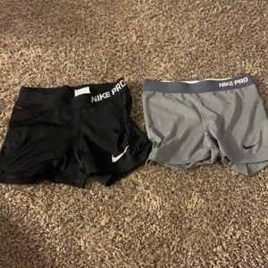 2 pairs of women’s nike pro shorts